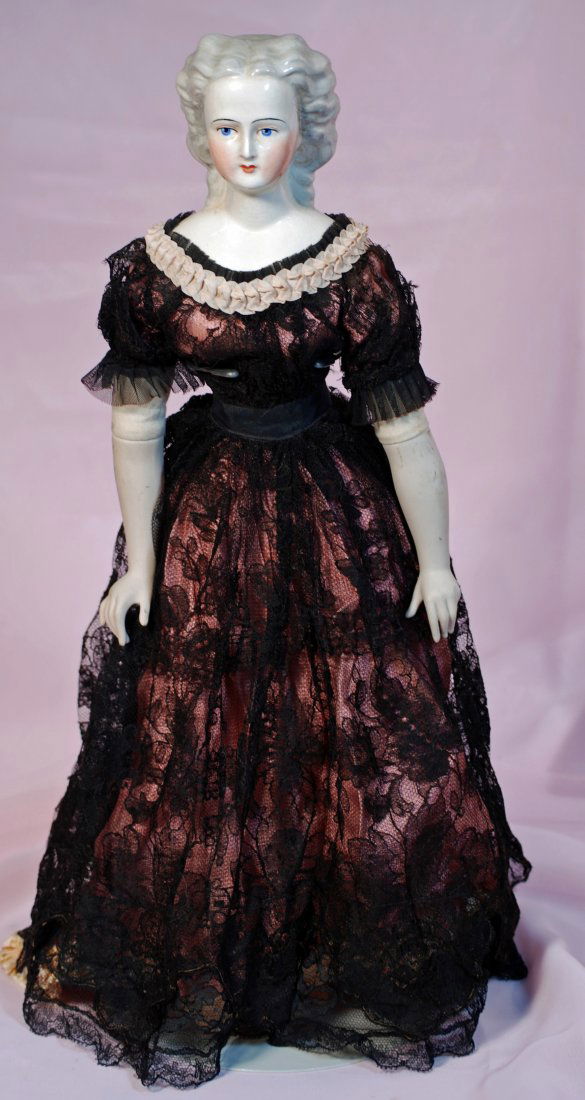 TWO CHINA DOLLS: (1) 7” blonde-haired doll house doll, (1 of 3)