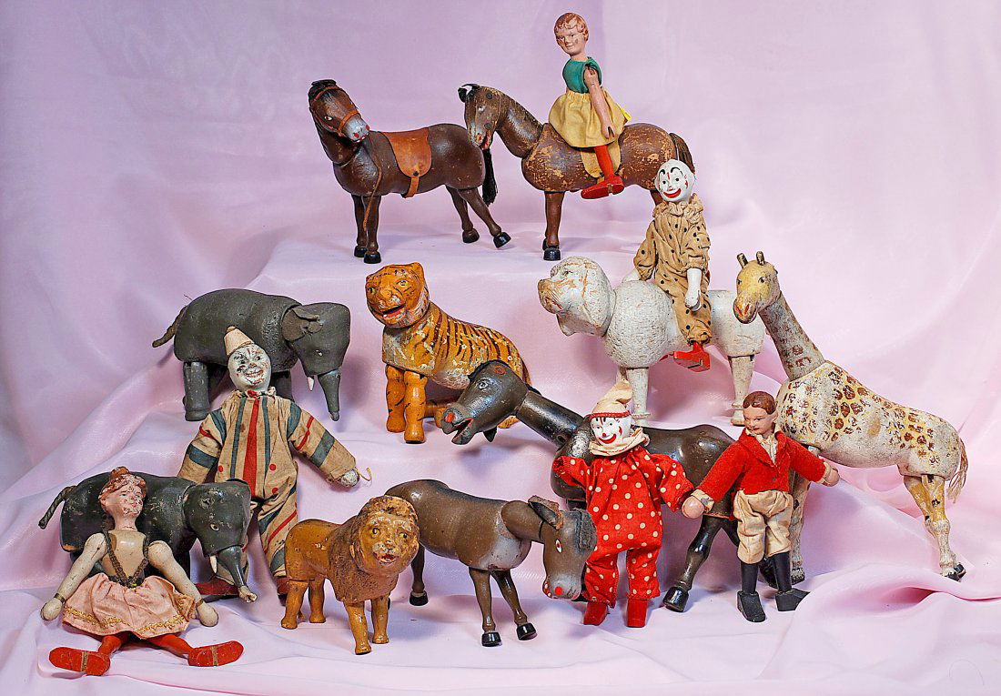 GROUP OF SIXTEEN SCHOENHUT CIRCUS ANIMALS AND PERFORMER (1 of 1)