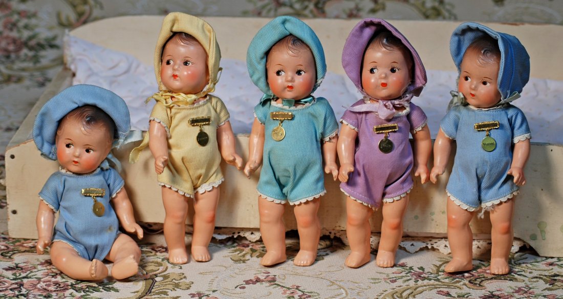 SET OF COMPOSITION DIONNE QUINTUPLETS WITH BED (1 of 1)