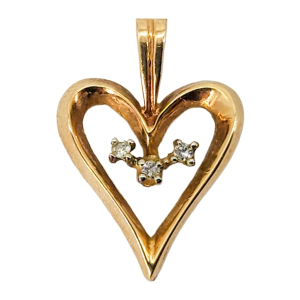 Vintage 10K Gold & Genuine Diamond Heart Pendant: Vintage 10K Gold & Genuine Diamond Heart Pendant. Three genuine 1.5mm diamonds. 3/4" x 9/16". Unmarked/unsigned. Does acid scratch test at 10K. Total weight: 1.13g