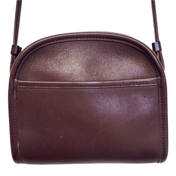 Vintage COACH Abbie Zip Bag 9017 in Brown w/ Brass Hardware: Vintage Coach Abbie Zip Bag 9017 in Brown w/ Brass Hardware. Crossbody strap. Zip top closure. Exterior pocket. Minimal wear/surface scuffs and/or scratches. Minimal color loss. Made in United States.