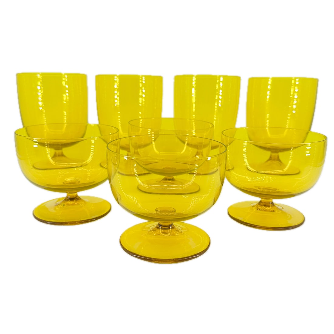 Bright Yellow UV Reactive Art Glass Cocktail Set: Bright Yellow UV Reactive Art Glass Cocktail Set, UV Reactive at Base of Glass includes 8 Total- 4 Tall and 4 Short. Tall Glasses are 5.25"/ H Short Glasses are 3.25" H