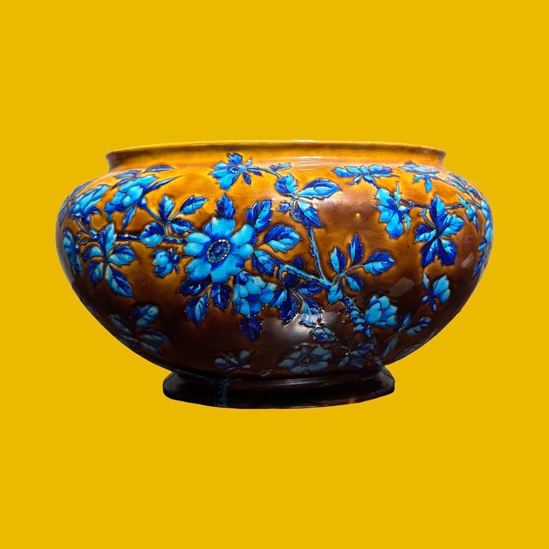 Amphora RStK Art Nouveau Bowl with Raised Blue Floral Decoration – Mold Number 2477: Authentic turn-of-the-century Amphora art pottery bowl, produced in the early 1900s in Bohemia (modern-day Czech Republic). This richly glazed, hand-crafted bowl features an organic bulbous form and i