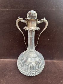 Antique Cut Glass Decanter with Silver Plate Dragon Handles and Faceted Stopper