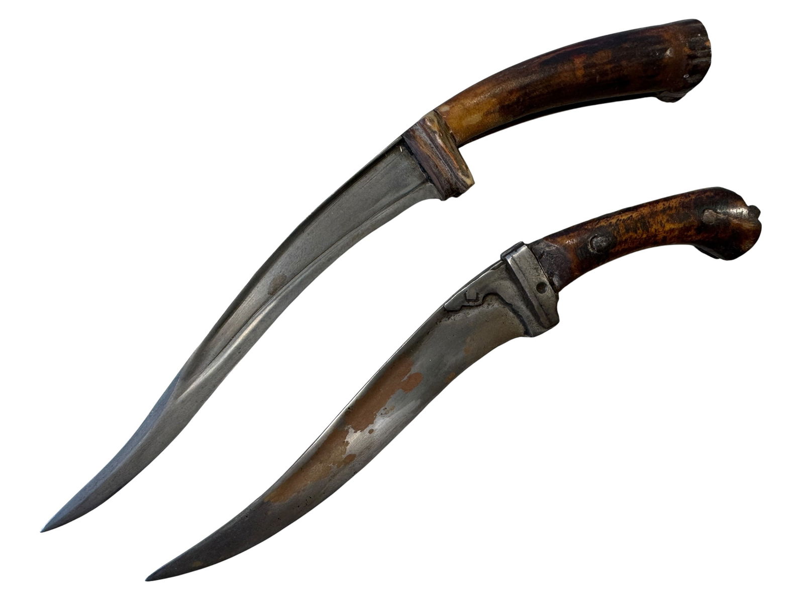 Pair Indo-Persian Pesh Kabz Daggers: Measurements:2.5" x 14" x 1"2.25" x 12.5" x 1"Photos are part of the description and should tell the whole story.