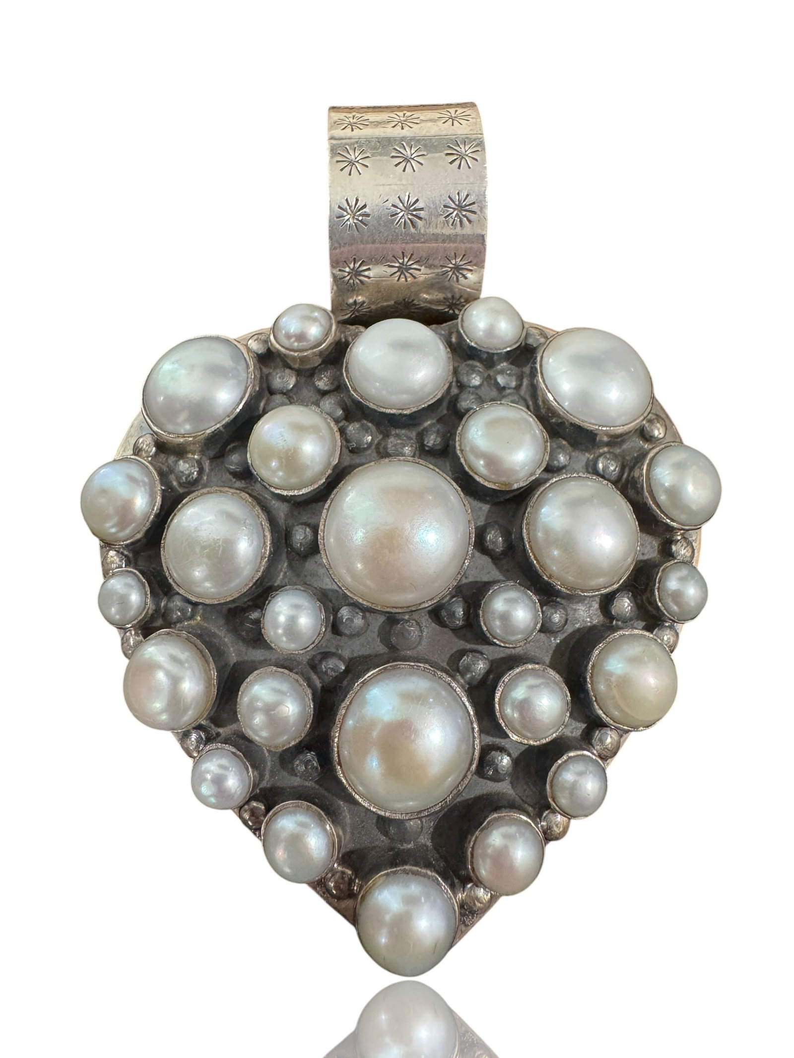 Dan Dodson Sterling Silver (.925) Heart Pendant: Approx. Gross Weight: 64.2 gramsPhotos are part of the description and should tell the whole story.