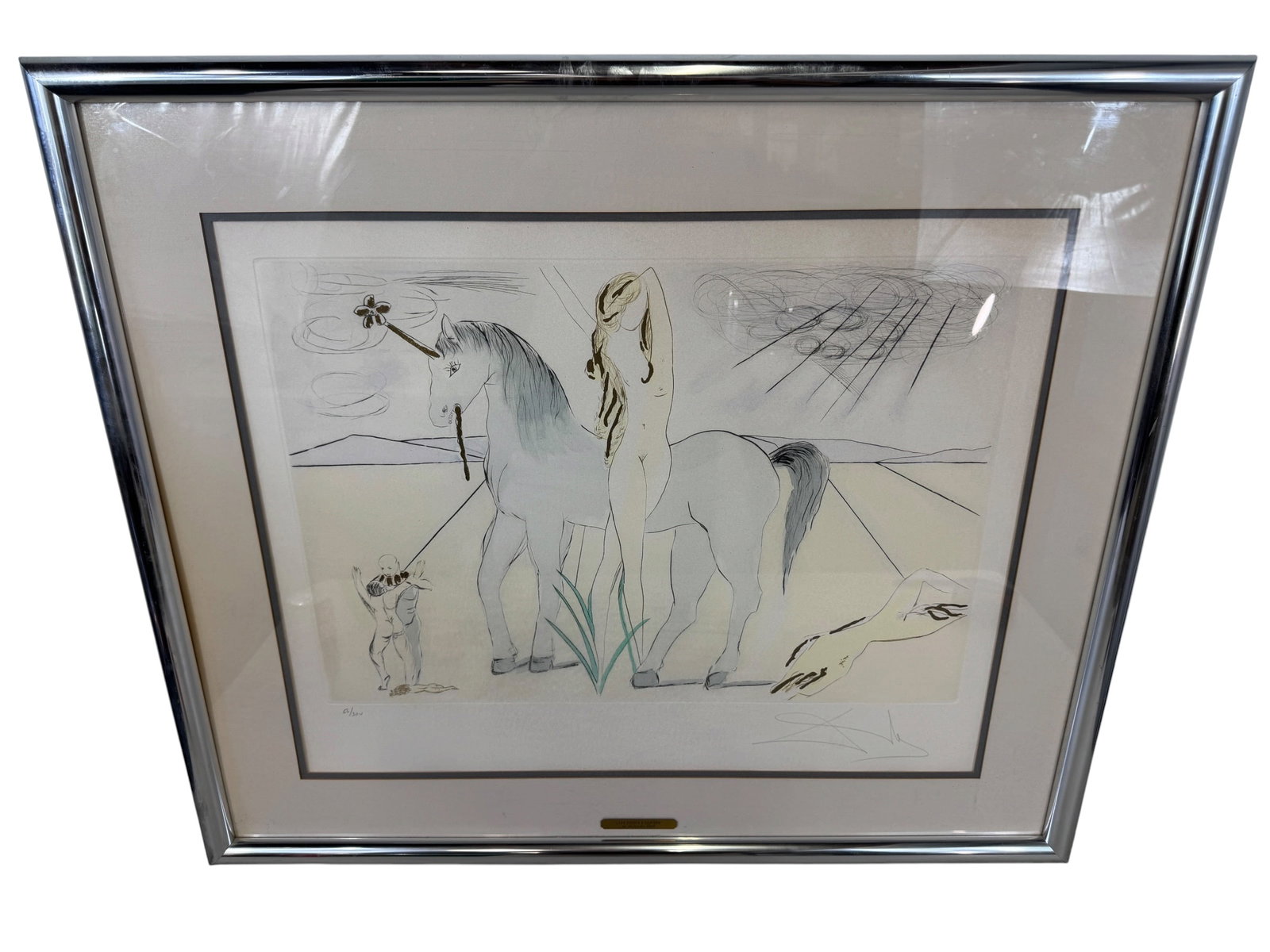 Salvador Dali "Lady Godiva & Unicorn" Framed Color Etching: Numbered 56/300, penciled signed. Image Dimensions: 21" x 26" Frame Dimensions: 29.375" x 34.375" Artist: Salvador Dali (1904-1989) was known for surrealist painting, drawing, photography and