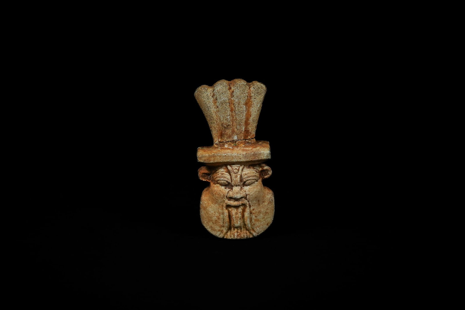 An Egyptian Faience Amulet of God Bes, Late Dynastic Period, 664-332 BC. (1 of 3)