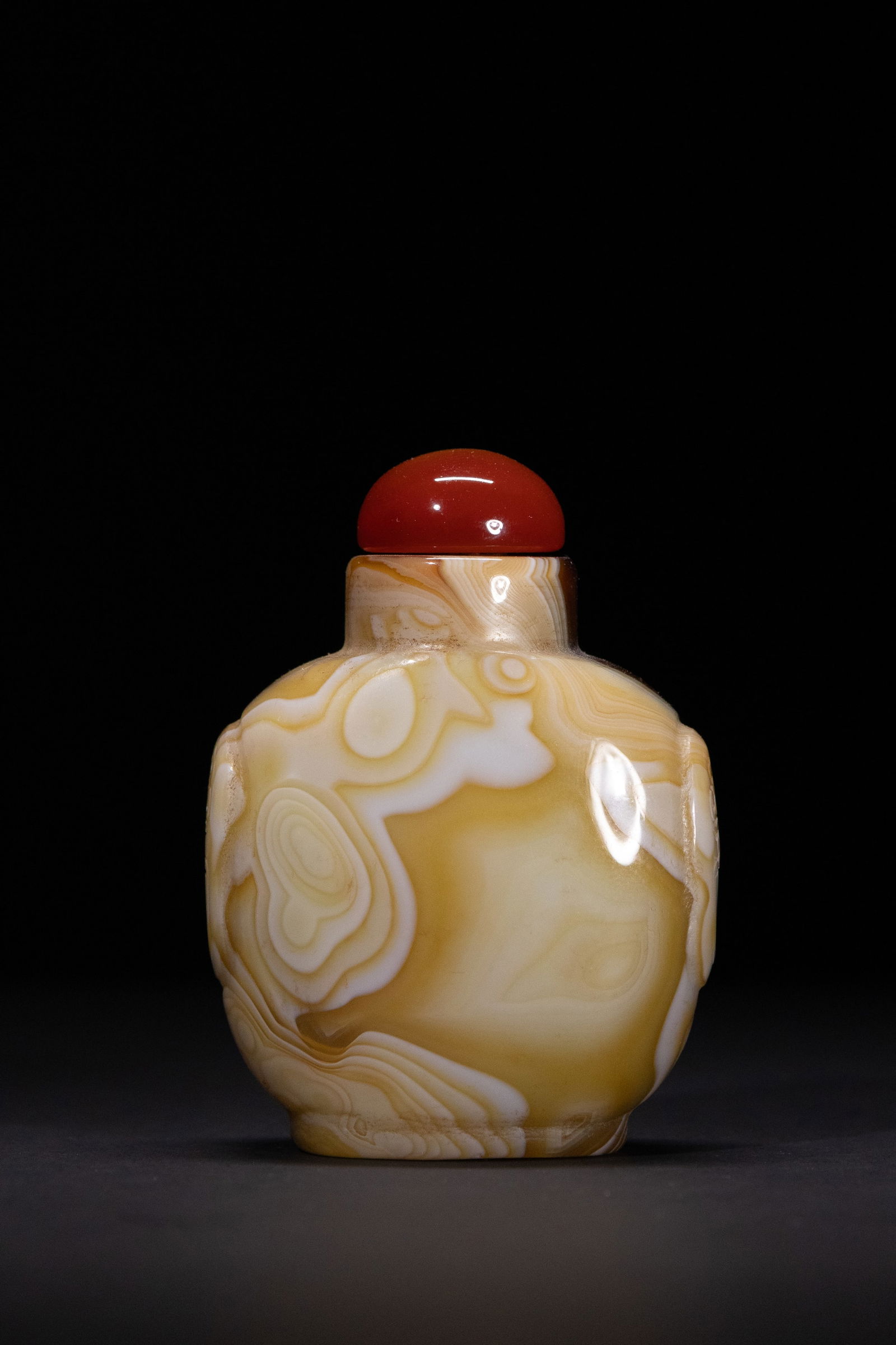 A Chinese Agate Snuff Bottle with Banded Patterning and Carnelian Stopper (1 of 2)