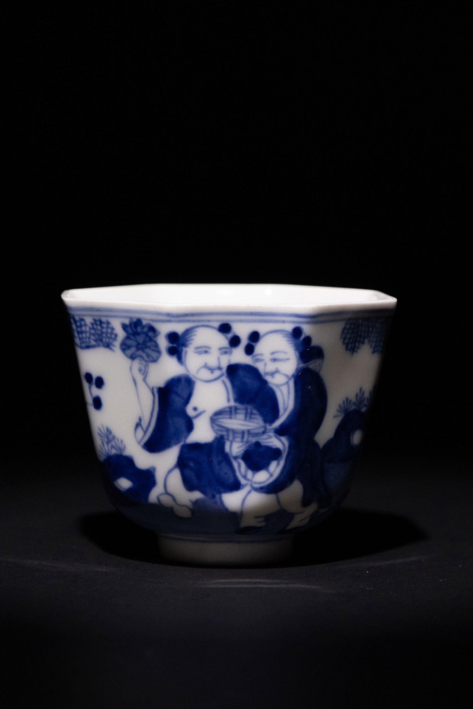 A Chinese Blue and White Octagonal Porcelain Teacup with Scholar Motifs, with a Character Mark to th (1 of 5)
