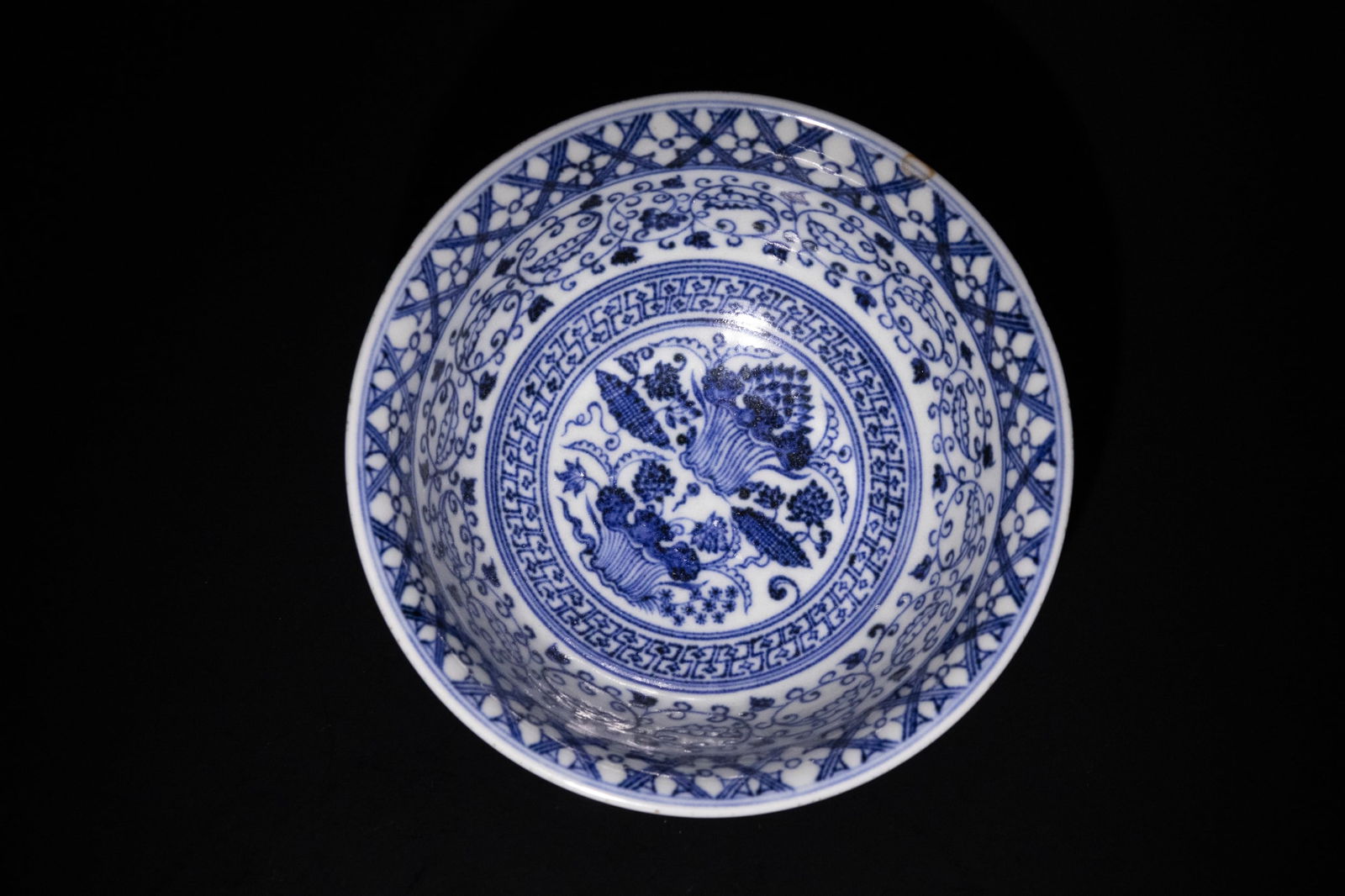 A Chinese Blue and White Porcelain Bowl with Basket Motif and Floral Patterns (1 of 5)