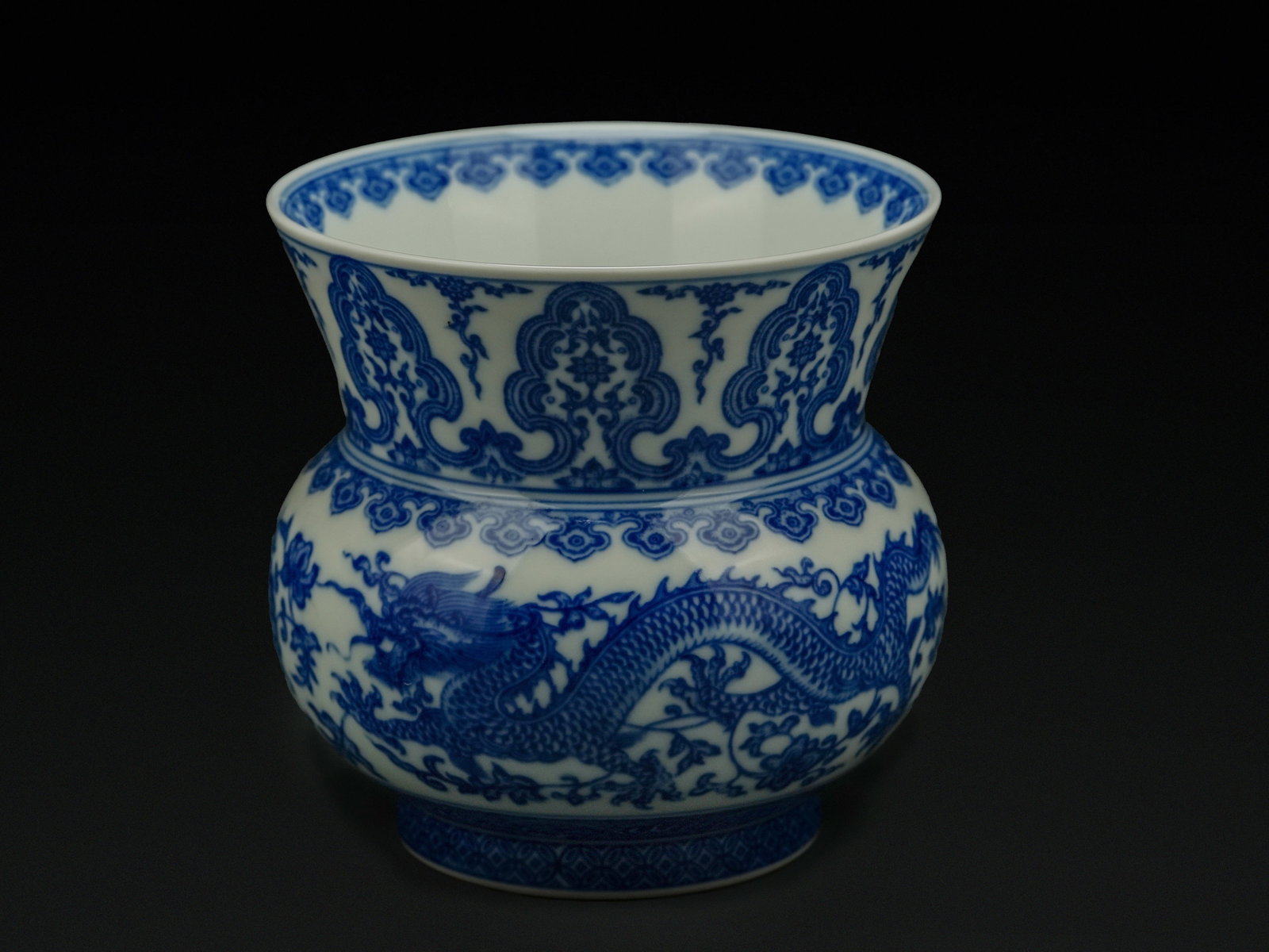 A Chinese Blue and White Porcelain Jar with Dragon Motifs. (1 of 3)