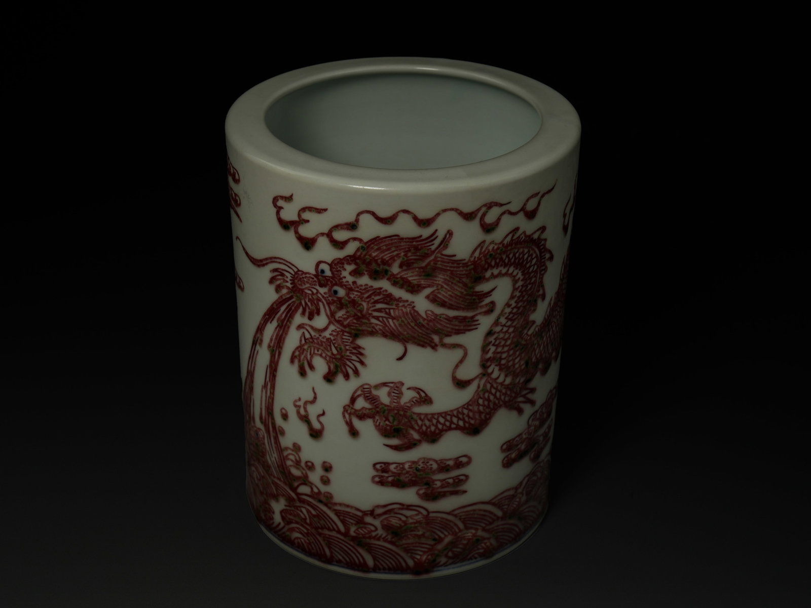 A Chinese Porcelain Brush Pot (Bitong) with Iron-Red Dragon Decoration, Kangxi Mark. (1 of 3)