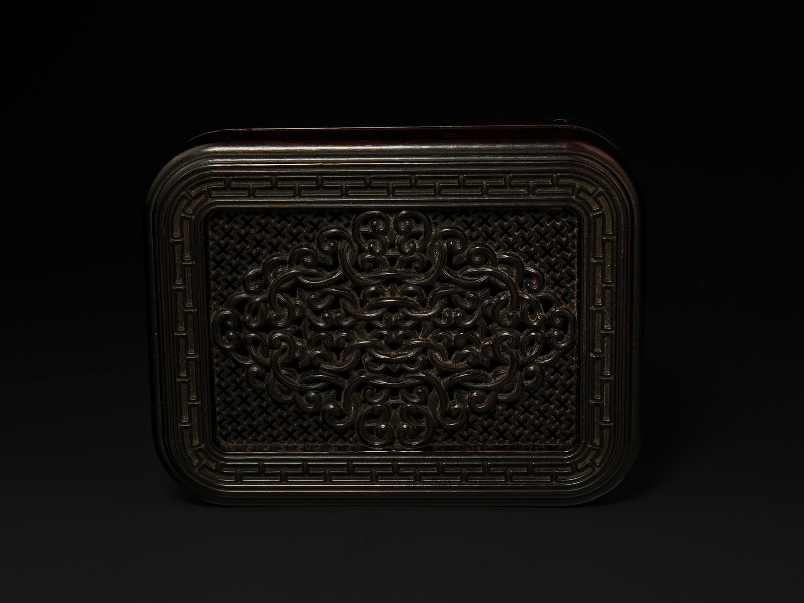 A Chinese Hardwood Rectangular Box and Cover with Openwork Lingzhi Medallion. (1 of 3)