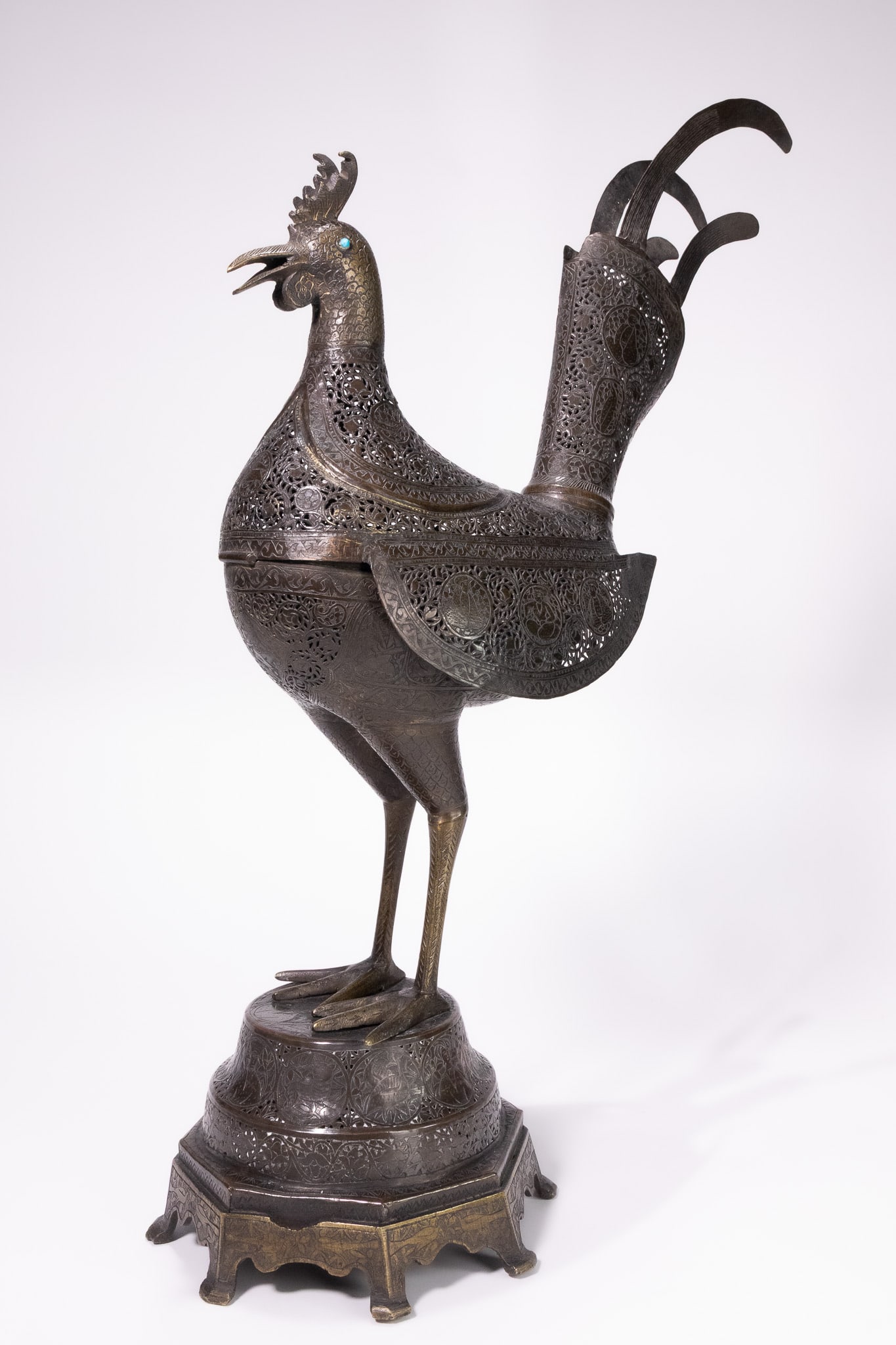 A LARGE PERSIAN QAJAR PIERCED AND ENGRAVED BRASS COCKEREL CENSER, 19TH CENTURY. (1 of 9)