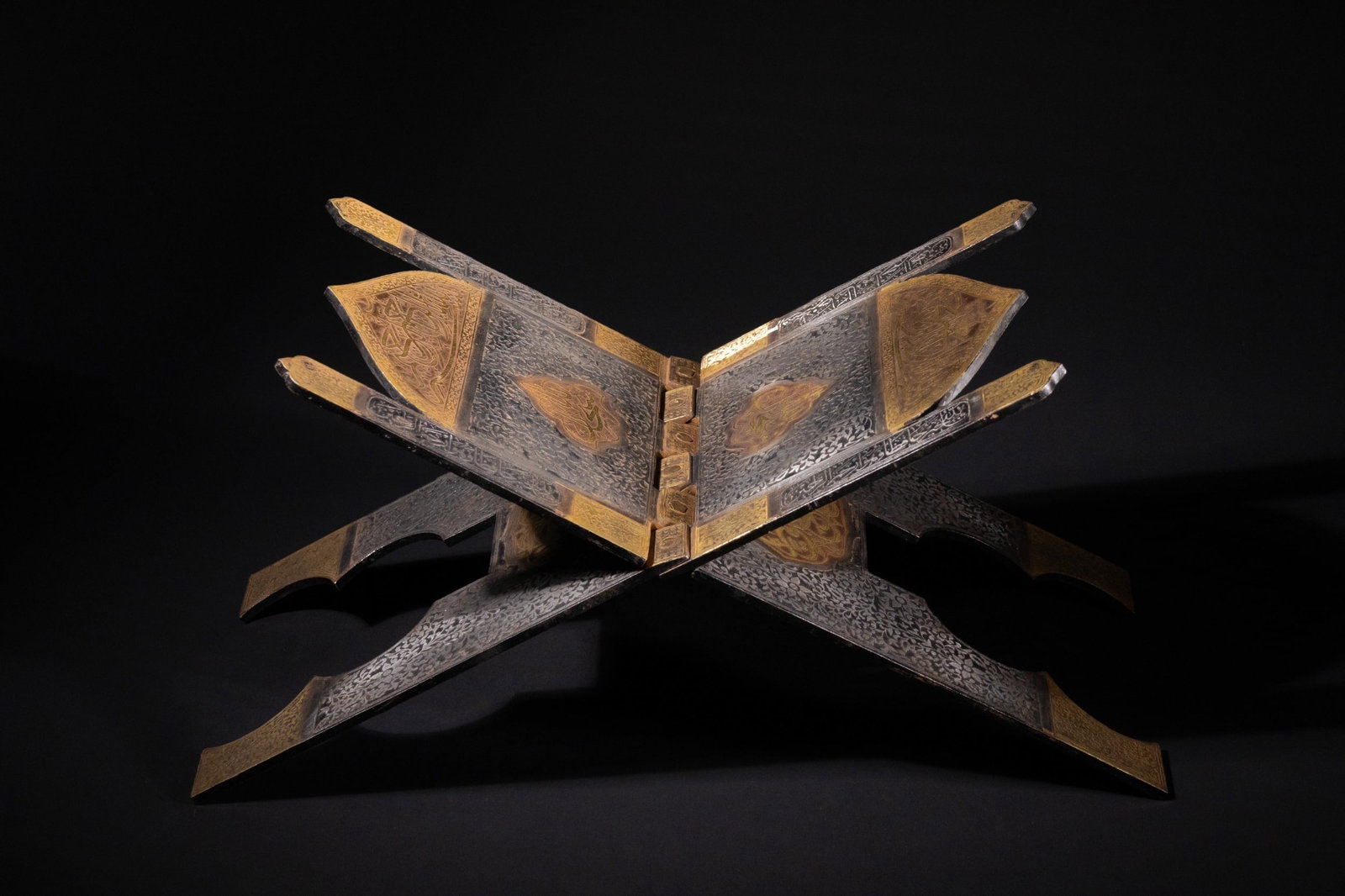 AN ISLAMIC MAMLUK STYLE GOLD INLAID METAL QURAN STAND (REHAL), 19TH CENTURY. (1 of 6)