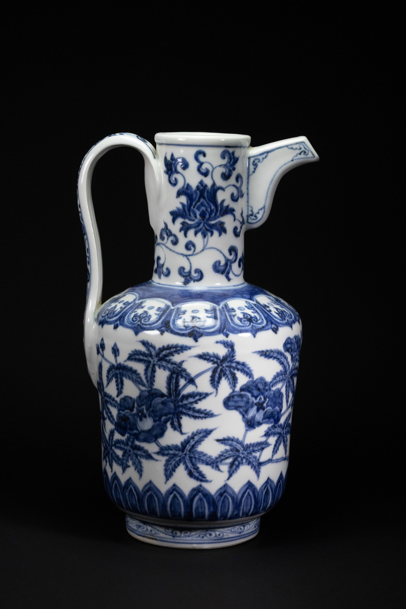 A CHINESE BLUE AND WHITE PORCELAIN EWER WITH FLORAL AND FOLIAGE MOTIFS, MADE FOR THE OTTOMAN MARKET. (1 of 7)