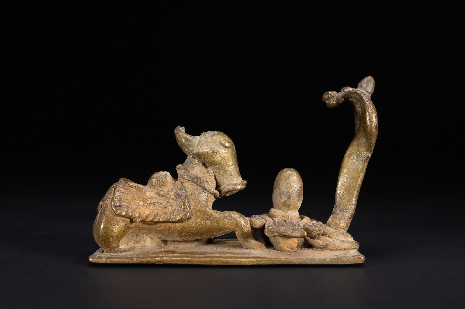 A WESTERN INDIAN FOLK STYLE BRONZE SHIVA DEVOTIONAL GROUP WITH NANDI AND NAGA, LATE 19TH/EARLY 20TH (1 of 5)