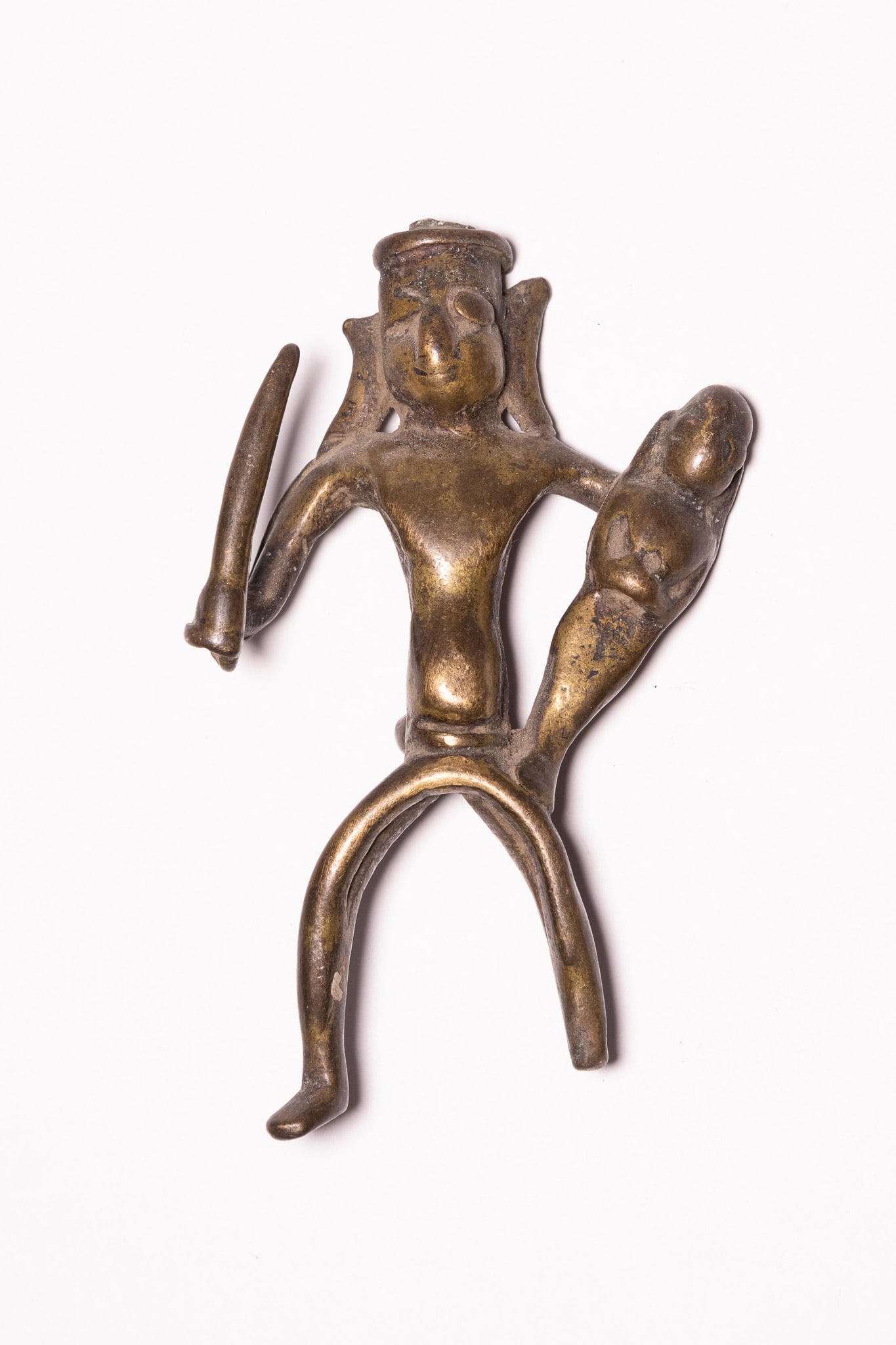 AN INDIAN FOLK COPPER-ALLOY FIGURINE OF A DEITY OR HERO, 19TH CENTURY. (1 of 2)