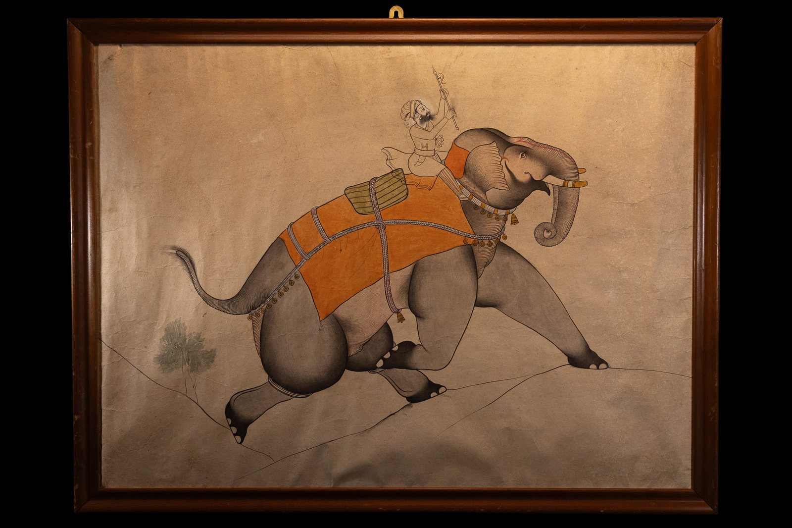 INDIAN SCHOOL, 19TH CENTURY, A MAHOUT RIDING A CAPARISONED ELEPHANT. (1 of 1)
