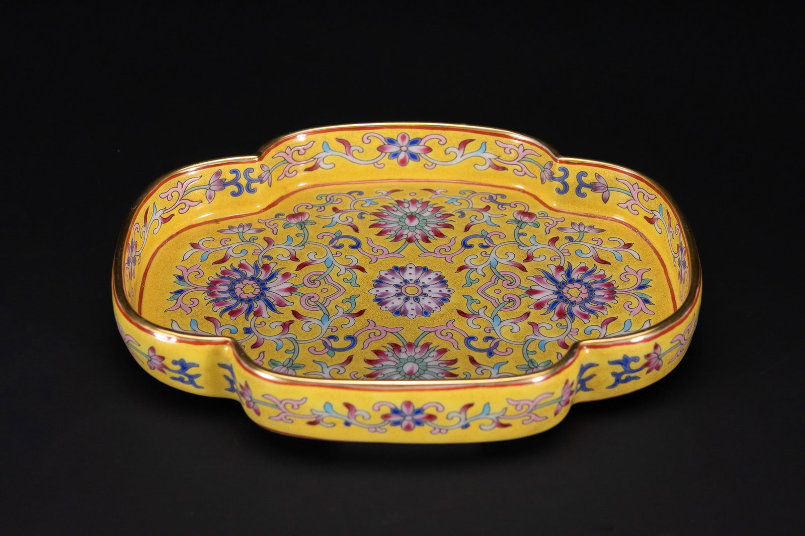 A CHINESE YELLOW-GROUND FAMILLE ROSE LOBED DISH, YONGZHENG MARK. (1 of 2)