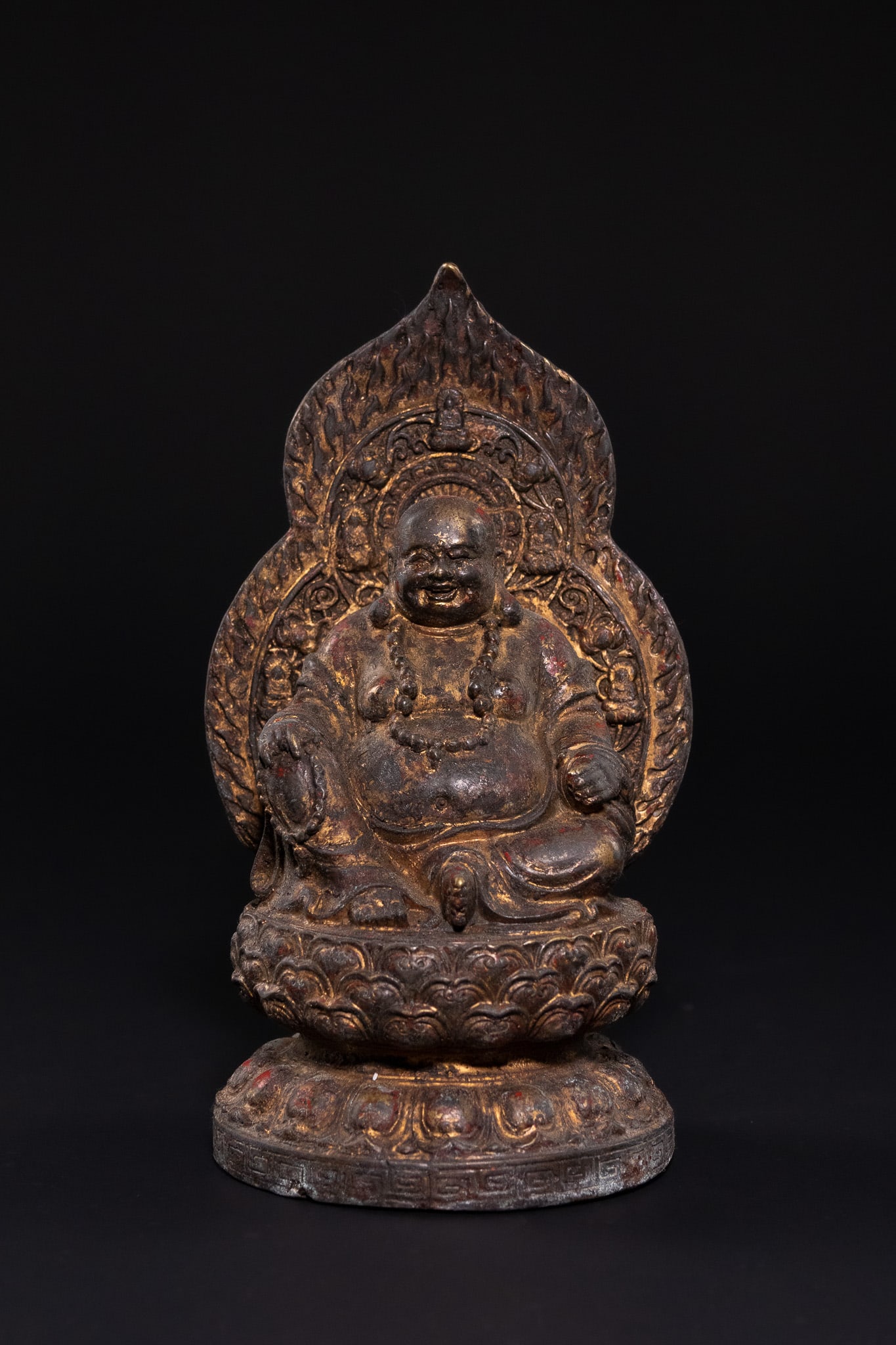 A CHINESE GILT-BRONZE FIGURE OF BUDAI, POSSIBLY LATE IMPERIAL PERIOD (1 of 3)