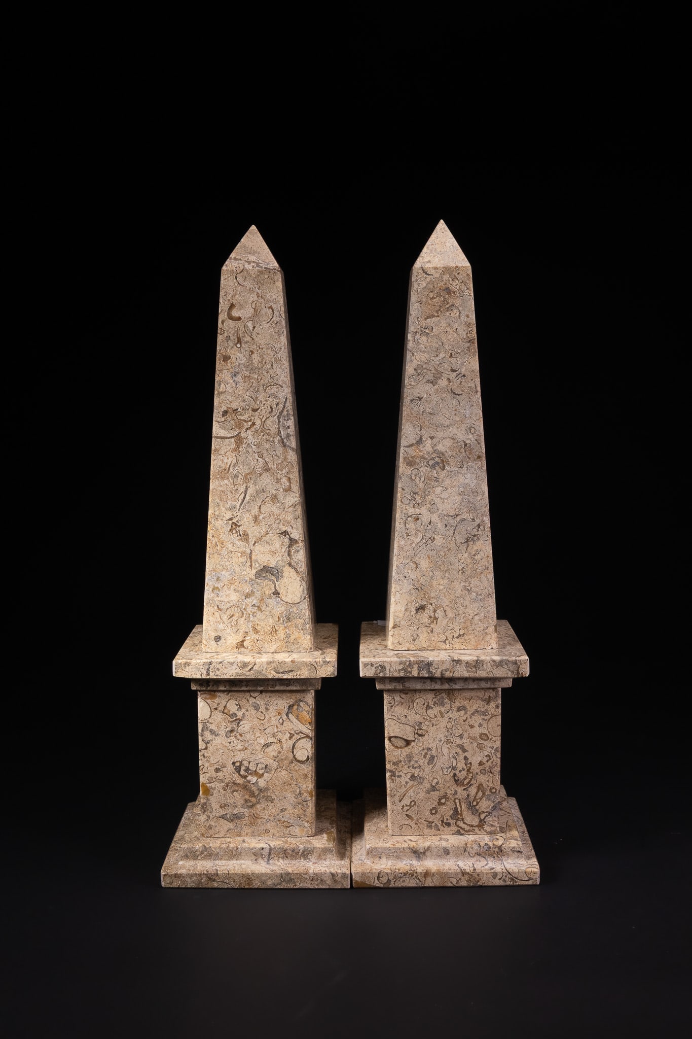 A PAIR OF MARBLE STYLE OBELISKS ON PEDESTAL BASES. (1 of 3)