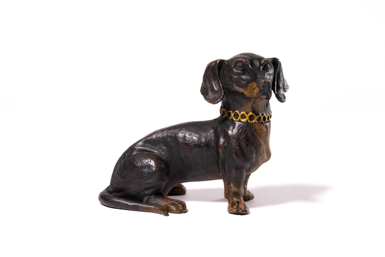 AN AUSTRIAN COLD-PAINTED VIENNA BRONZE SEATED DACHSHUND INKWELL. (1 of 4)