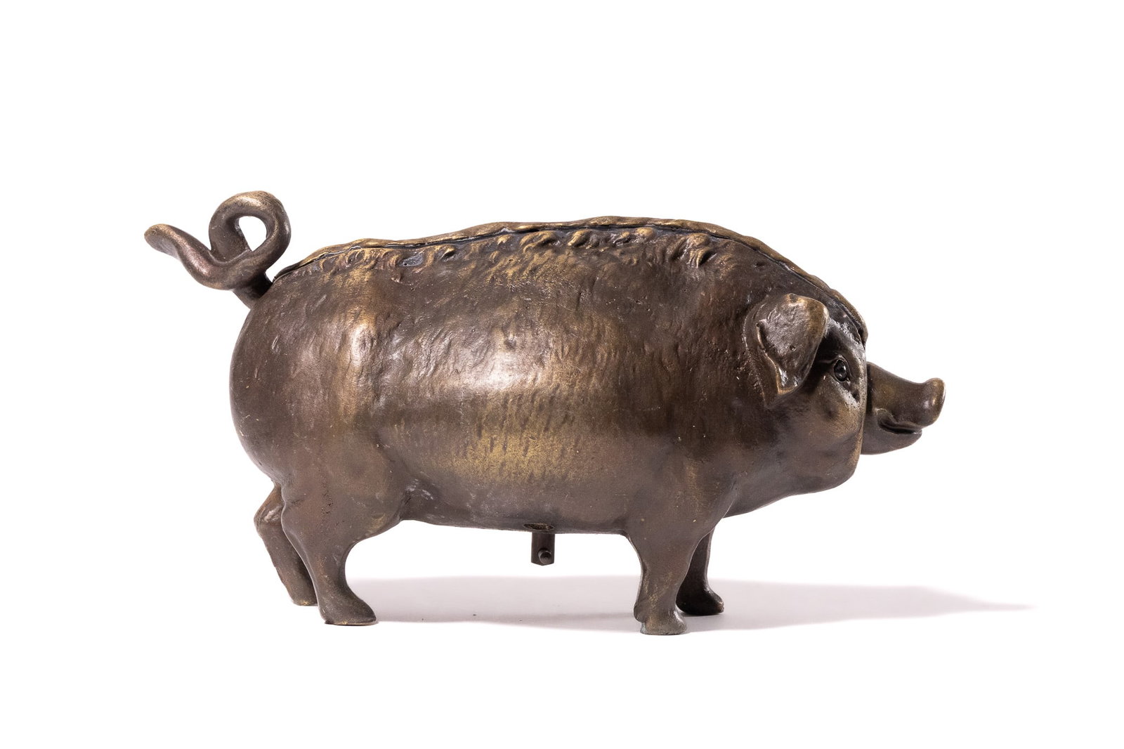 A NOVELTY BRONZE TABLE BELL IN THE FORM OF A PIG. (1 of 5)