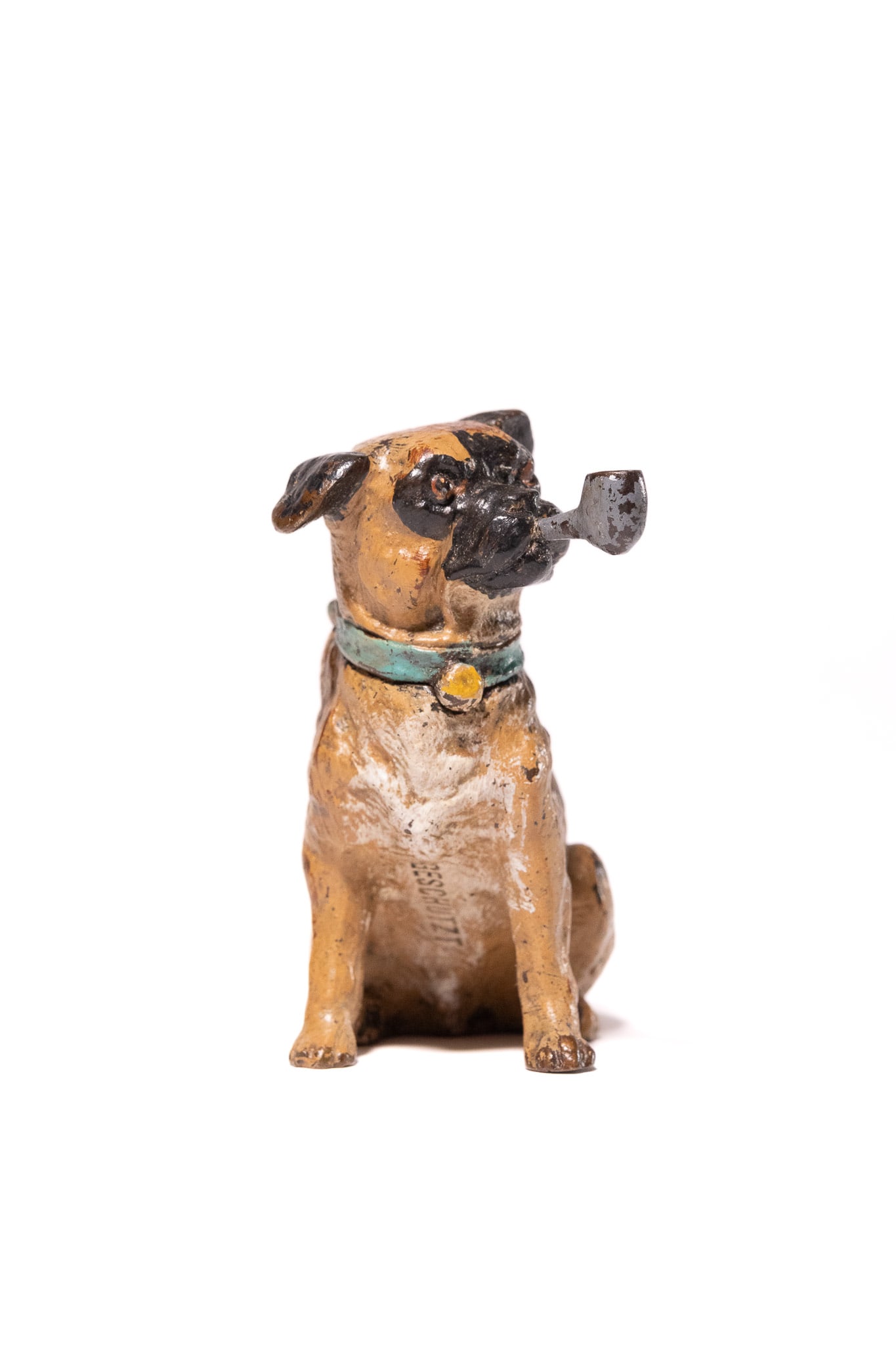 A COLD-PAINTED BRONZE THIMBLE CASE IN THE FORM OF A SEATED PUG DOG SMOKING A PIPE. (1 of 5)