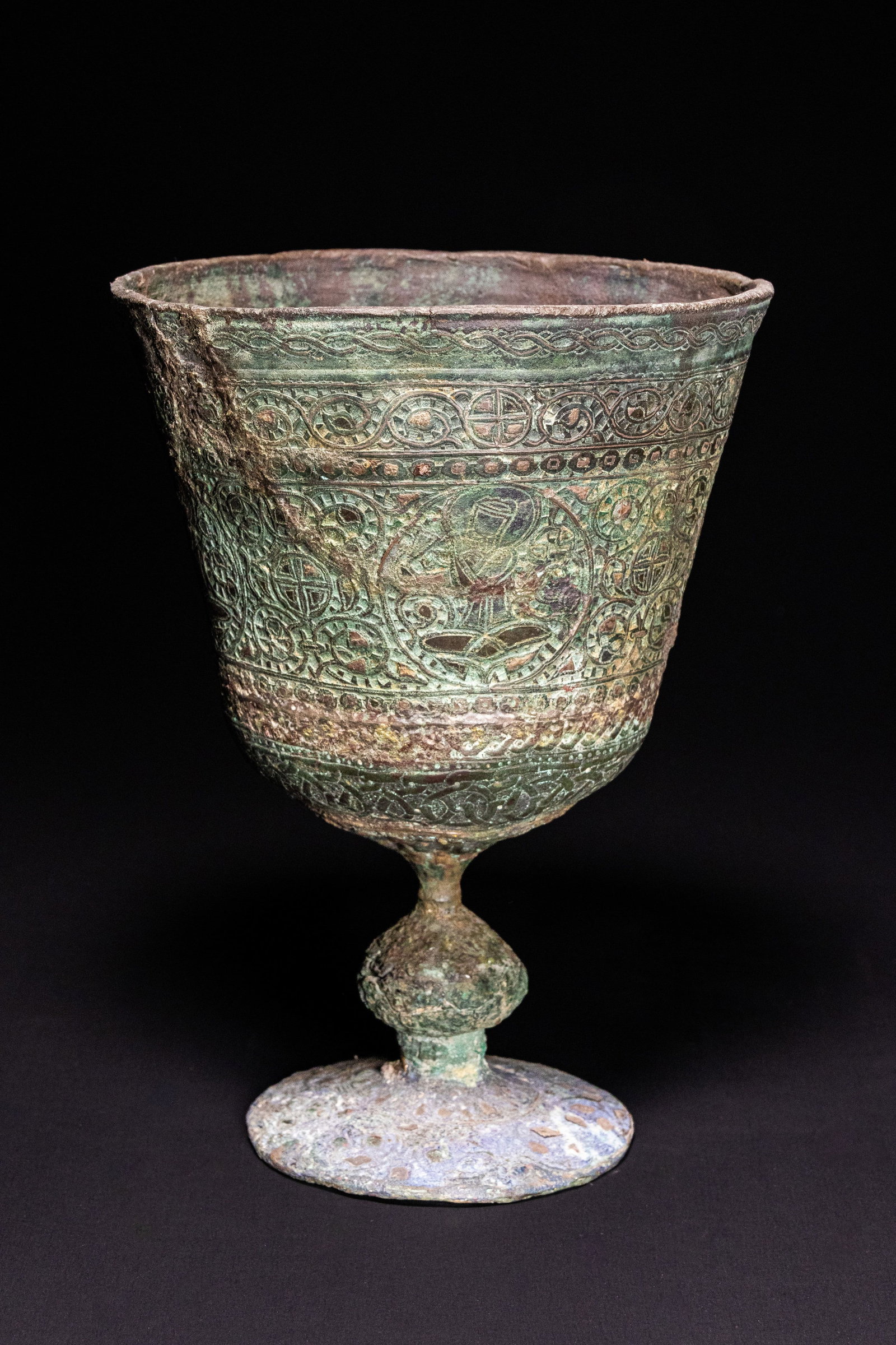 A MAMLUK OR AYYUBID BRONZE GOBLET WITH SILVER-INLAID INTERLACE AND MEDALLION DECORATION, 13TH-14TH (1 of 4)