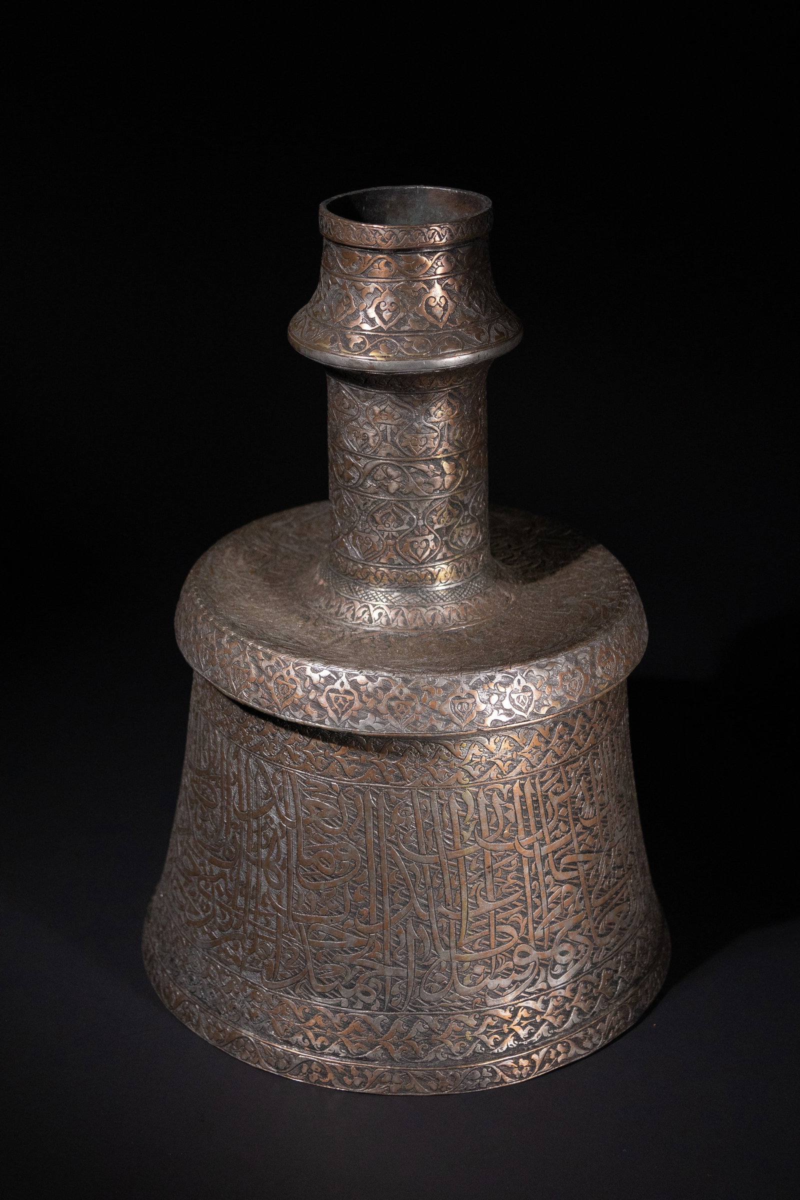 A MAMLUK COPPER CALLIGRAPHIC CANDLESTICK, 14THâ€“15TH CENTURY. (1 of 7)