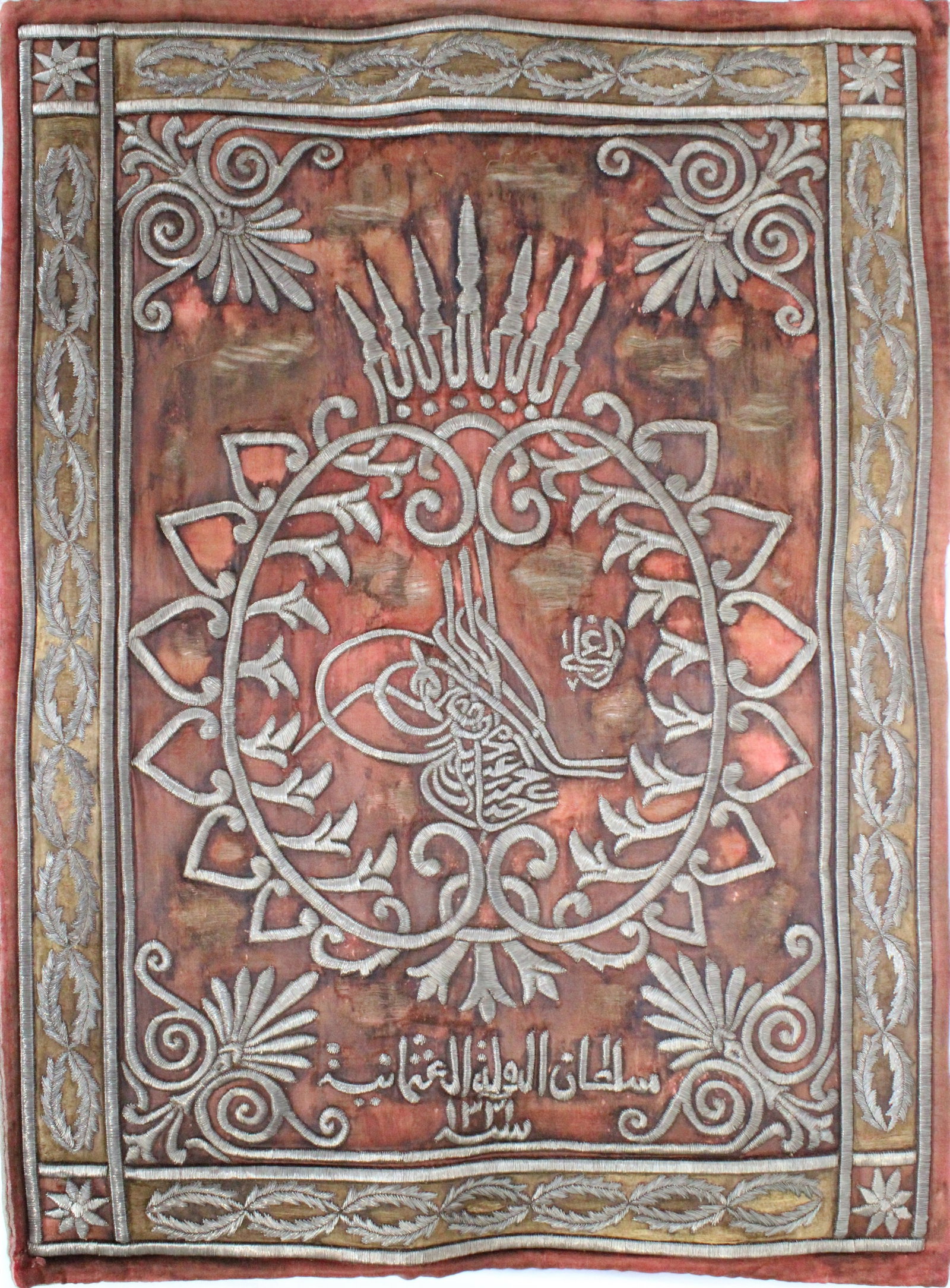 AN OTTOMAN METAL-THREAD EMBROIDERED CURTAIN WITH TUGHRA, 19TH CENTURY. (1 of 6)