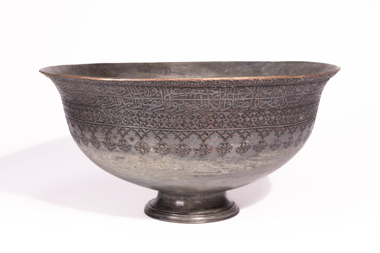 A PERSIAN TINNED COPPER BOWL, 18THâ€“19TH CENTURY. (1 of 4)
