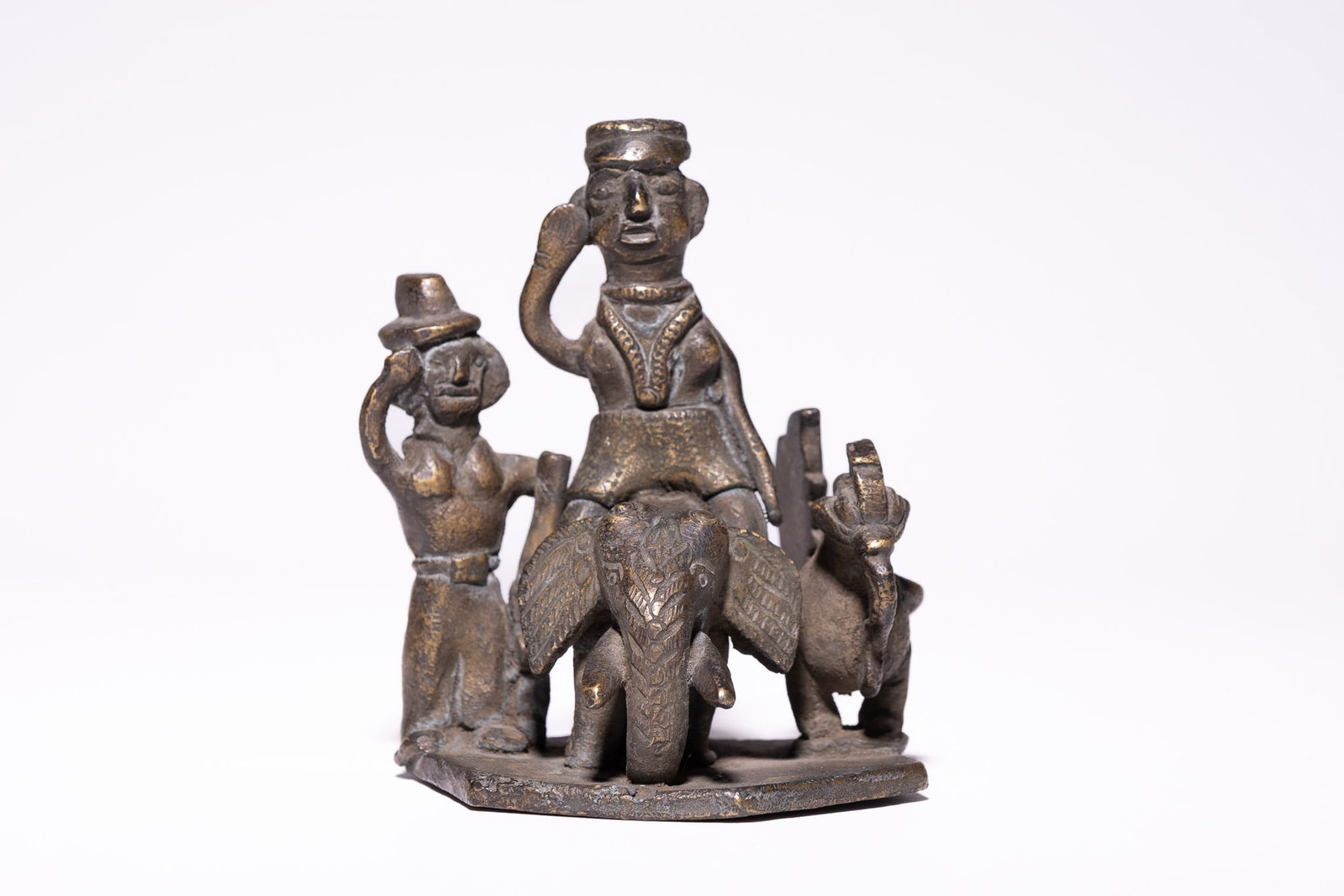 AN INDIAN BRONZE GROUP DEPICTING FIGURES WITH ELEPHANT AND ATTENDANT ANIMAL, 18THâ€“19TH (1 of 4)