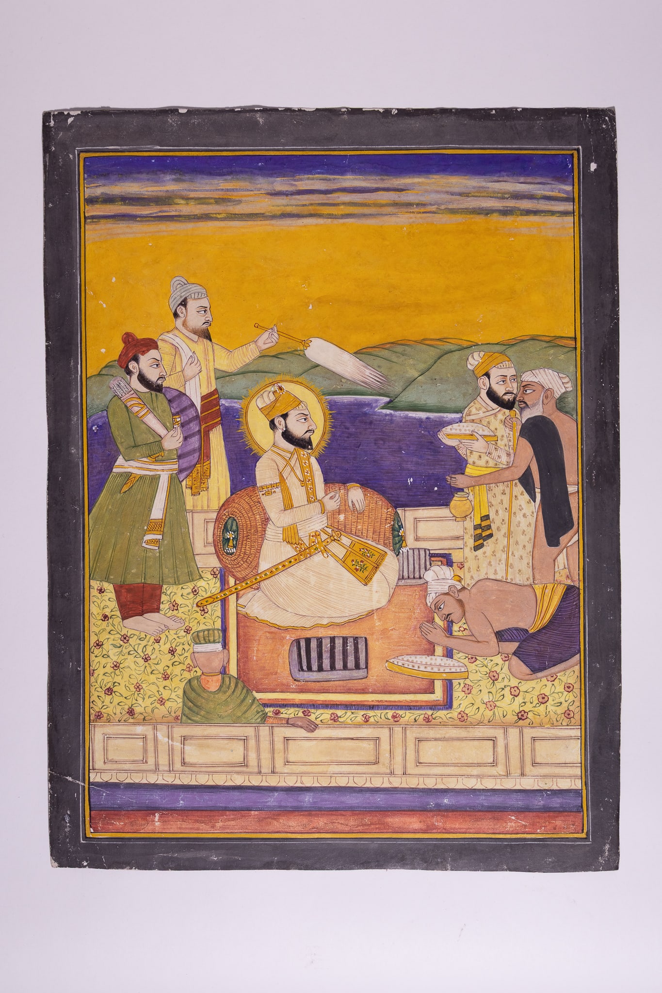 AN INDIAN MINIATURE PAINTING OF GURU GOBIND SINGH IN DARBAR, 19TH CENTURY. (1 of 1)