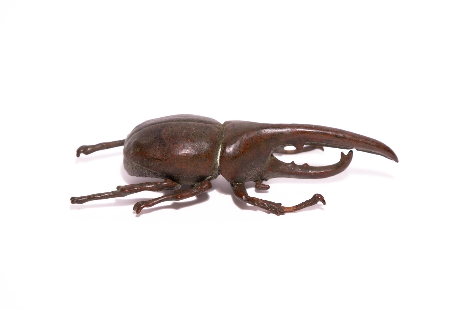 A JAPANESE BRONZE OKIMONO OF A HERCULES BEETLE. (1 of 2)