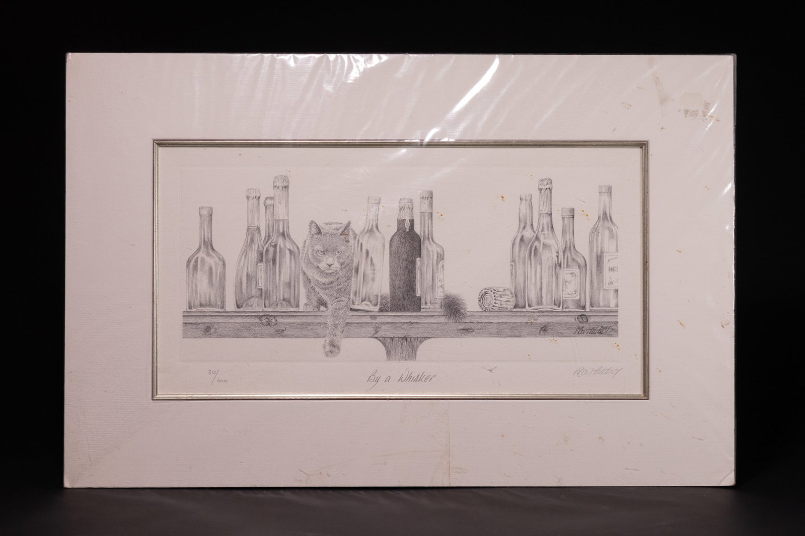 PETER HILDICK, BY A WHISKER, LIMITED EDITION SIGNED PRINT 30/600.: A limited edition print titled By a Whisker by the British artist Peter Hildick. The composition depicts a domestic cat peering from behind an arrangement of glass wine and oil bottles on a wooden she