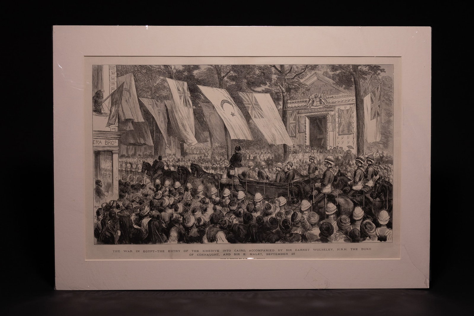 THE WAR IN EGYPT: THE ENTRY OF THE KHEDIVE INTO CAIRO, 25 SEPTEMBER 1882, PRINT, LATE 19TH CENTURY.: A 19th-century print illustrating a significant historical moment from the Anglo-Egyptian War: the entry of Khedive Tewfik into Cairo on 25 September 1882. The scene depicts a triumphal procession thr