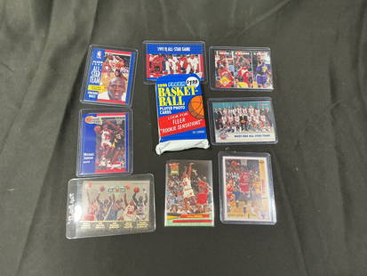 1991 Fleer NBA Basketball Trading Cards Featuring Michael Jordan with Unopened Pack: Grouping of 1991 Fleer NBA Basketball trading cards centered on Michael Jordan, including multiple All-Star and League Leaders cards, action shots, and team highlight issues. Additional cards include