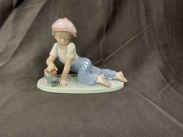 Lladro Engineer of Tomorrow' Porcelain Figurine No. 7619 (Boy with Toy Train)