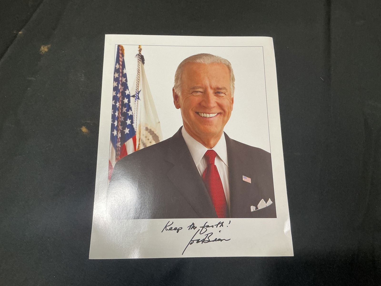 Signed Official Portrait Photograph of Vice President Joe Biden – “Keep the faith!: Color glossy 8x10 official-style portrait of Joe Biden inscribed and signed “Keep the faith! Joe Biden”.