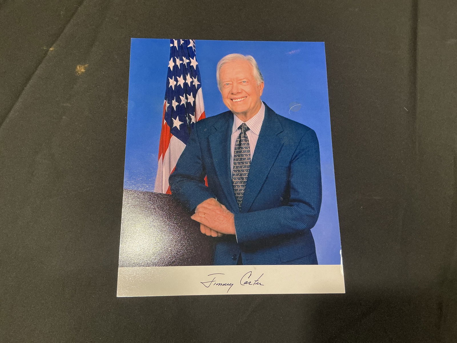 Signed Official Portrait Photograph of President Jimmy Carter: Color 8x10 official portrait of President Jimmy Carter hand-signed “Jimmy Carter”.