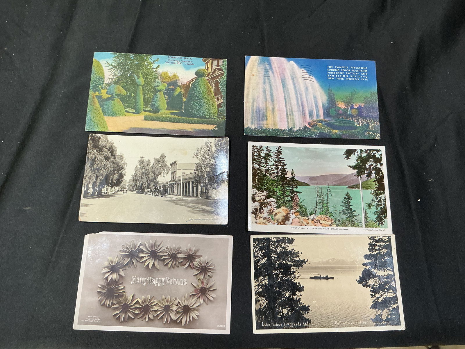 Collection of Early 20th-Century Scenic and Greeting Postcards, Including Lake Tahoe & Firestone: Grouping of six early 20th-century postcards, including real-photo and lithographed examples. Subjects include Lake Tahoe, Nevada Side; the Firestone Singing Color Fountain at the 1939 New York World'