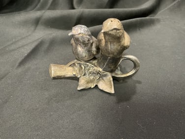 Pewter bird-form salt and pepper shakers on branch base