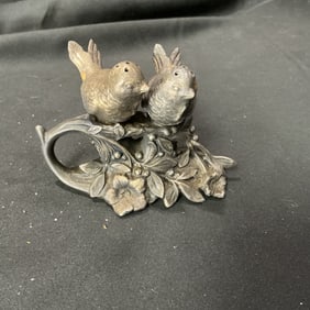 Pewter bird-form salt and pepper shakers with floral base