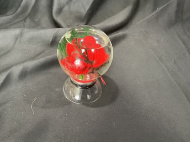 Glass dome paperweight with artificial rose