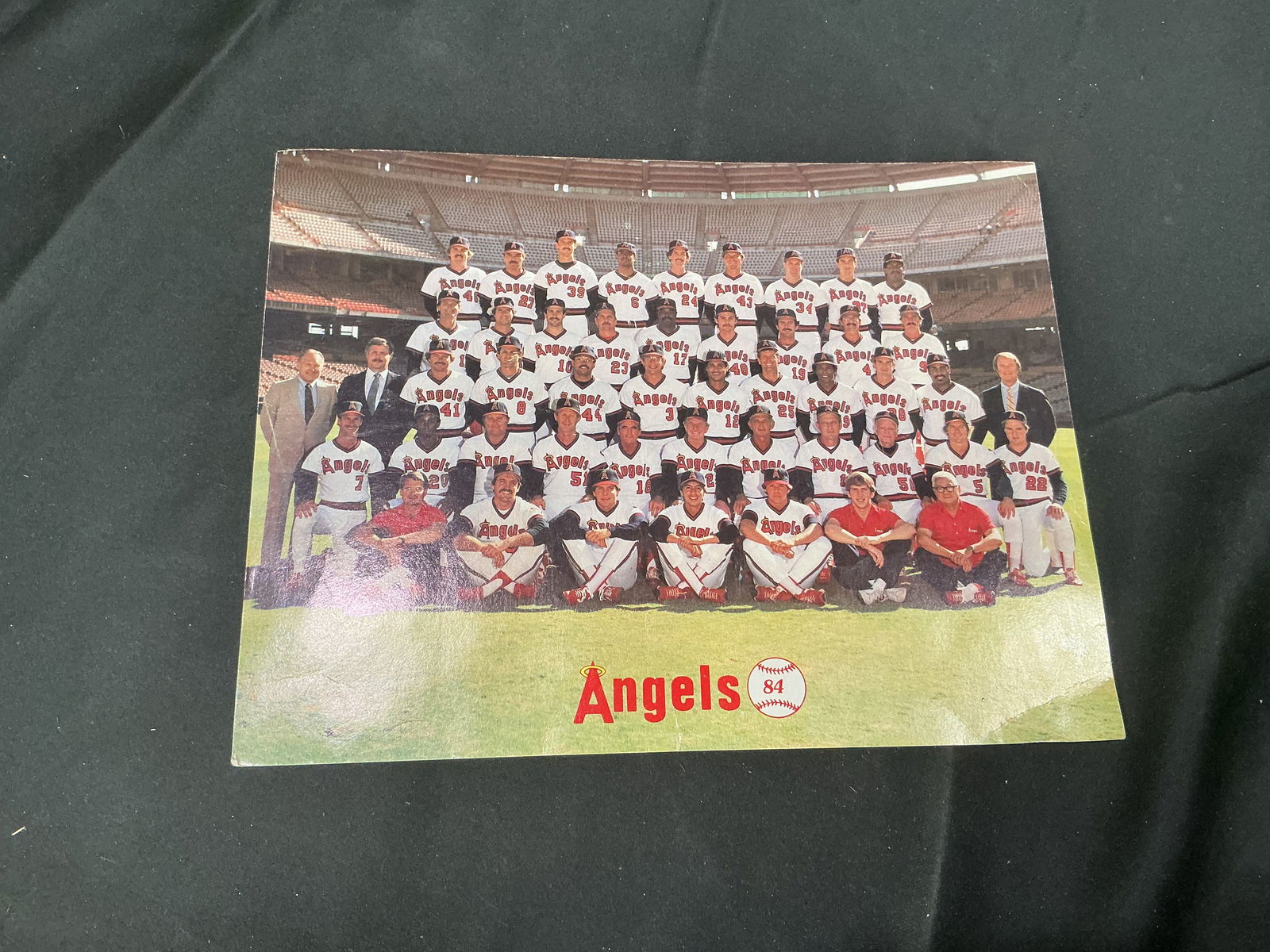 1984 California Angels Team Photo & 1985 Home Schedule Promo Card (Brackett Field Aviation): Vintage California Angels team photo card with 1984 Angels identification and a printed 1985 home schedule on the reverse. Features Brackett Field Aviation Inc. advertisement (La Verne, California). N