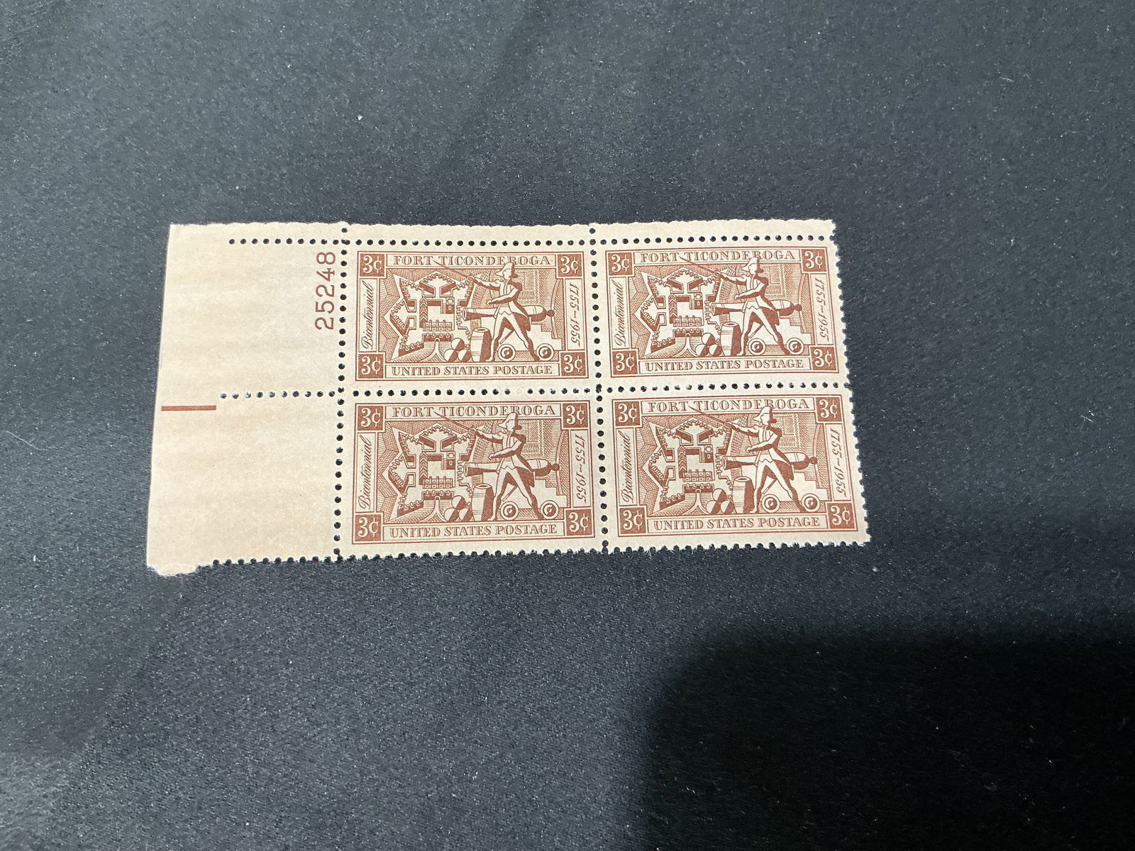U.S. 3c Fort Ticonderoga commemorative plate block of 4: U.S. 3-cent Fort Ticonderoga commemorative (French & Indian War era theme). Plate block of four with attached selvage and plate number, as shown.
