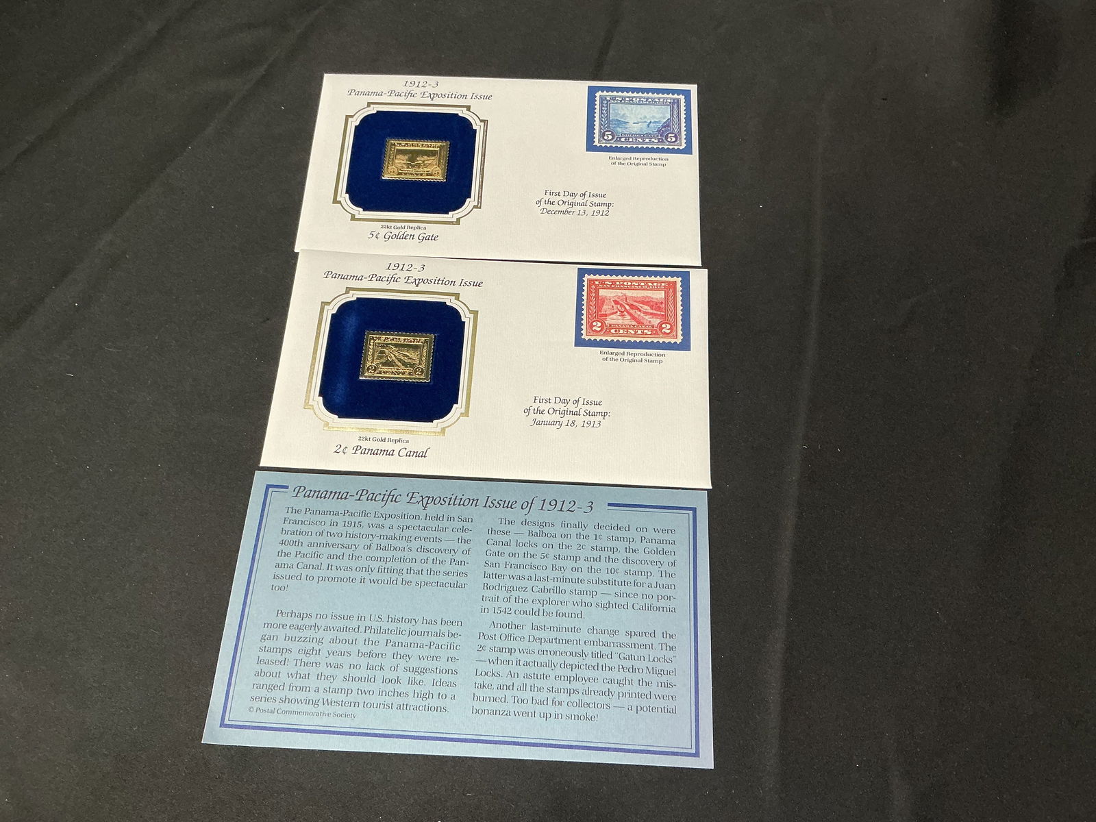 1912-13 Panama-Pacific Exposition 22kt Gold Replica Pair Golden Gate Canal: Matched pair of 22kt gold replicas from the Panama-Pacific Exposition issue including the 5c Golden Gate and 2c Panama Canal. Both housed in their original blue velvet presentation cards with the Post